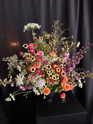 Colorful flower arrangement on a black background