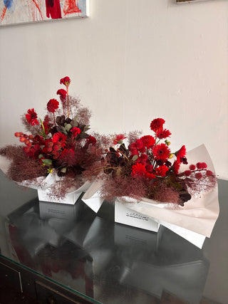 Red flowers and burgundy smoke bush for delivery in los angeles