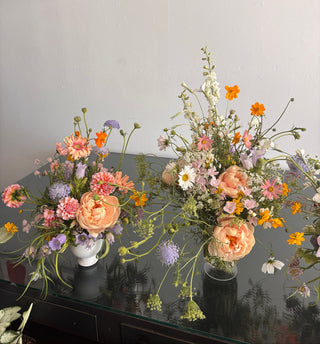 same day flower delivery in Los Angeles by Wildstems - Peonies and wildflowers arrangements on a table