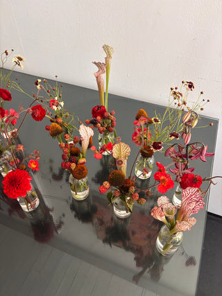 Summer bud vases with red flowers and berries for events in los angeles by wildstems