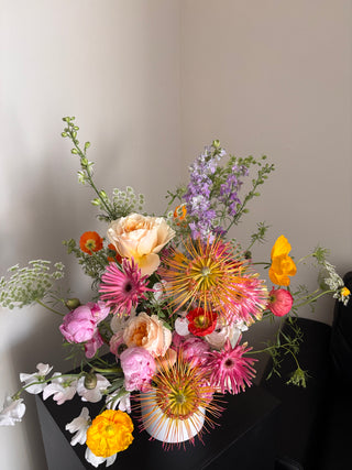 Colorful bouquet of flowers with a neutral background