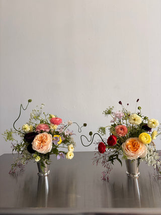 event centerpieces in silver vases: garden roses, ranunculus, seasonal wildflowers in silver vases perfect for events in Los Angeles by Wildstems