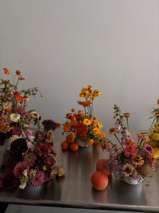 colorful event flowers and fruits on silver table by wildstems los angeles