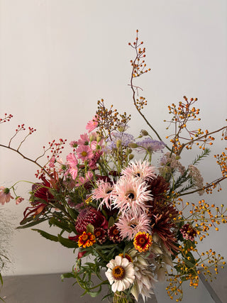 Bouquet of fall flowers with a neutral background