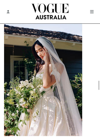 bride holding her bridal bouquet in vogue Australia feature, florals by wildstems