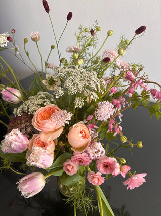 Bouquet of garden roses flowers with pink and white tones on a neutral background