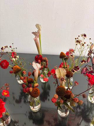 Summer bud vases with red flowers and berries for events in los angeles by wildstems