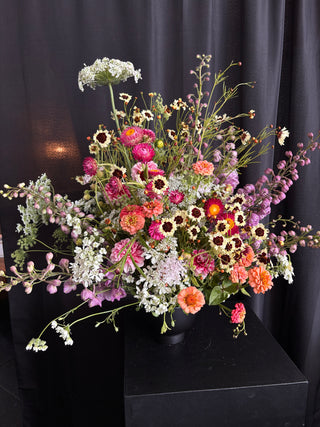 Colorful bouquet of flowers on a black background