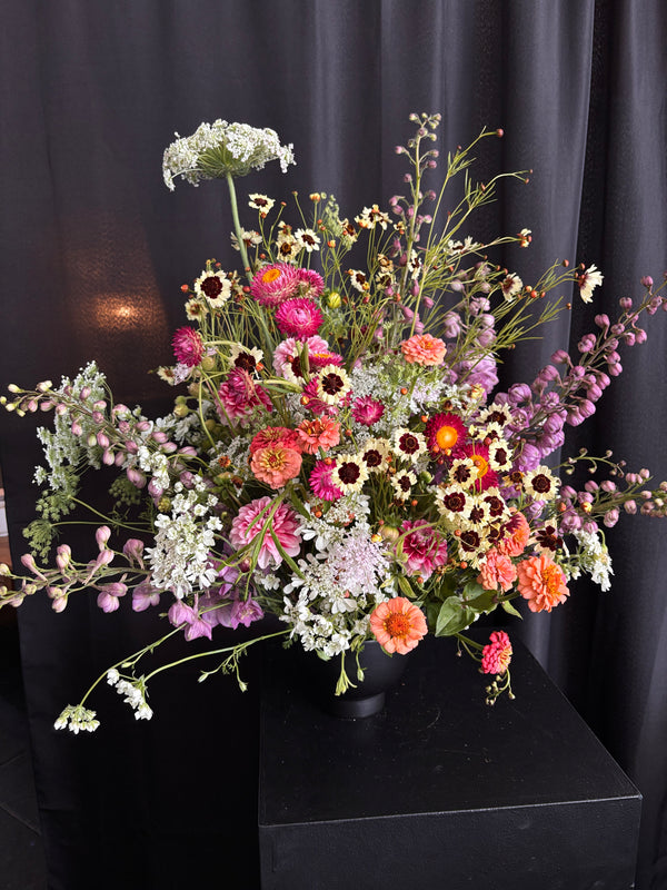 Colorful bouquet of flowers on a black background
