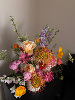 Colorful bouquet of flowers with a neutral background